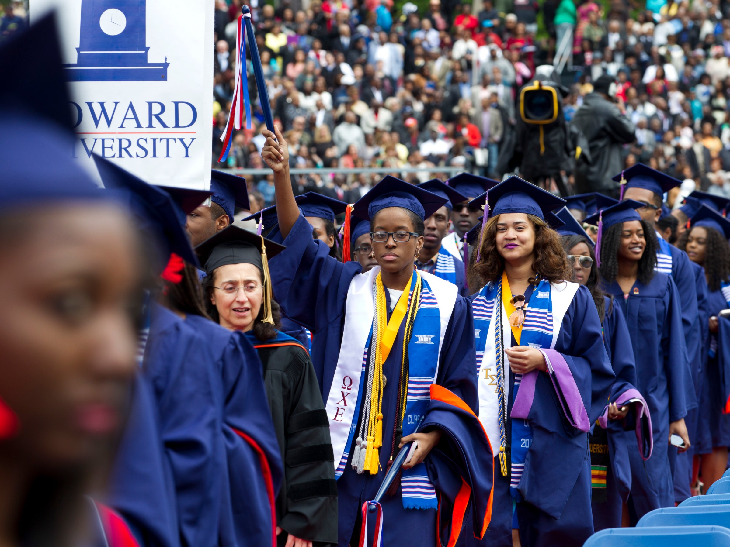 Graduate students walk to their places as their arrive to the 2016 Howard University graduation ceremony in Washington, Saturday, May 7, 2016.