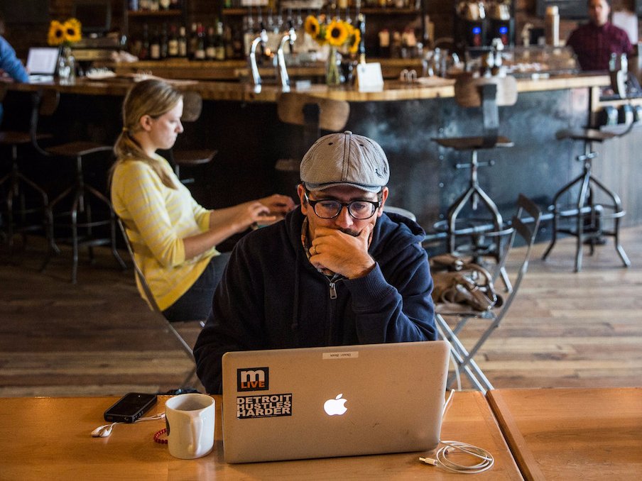 working laptop coffee shop