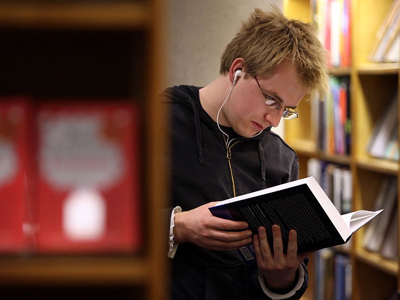 Student reading book