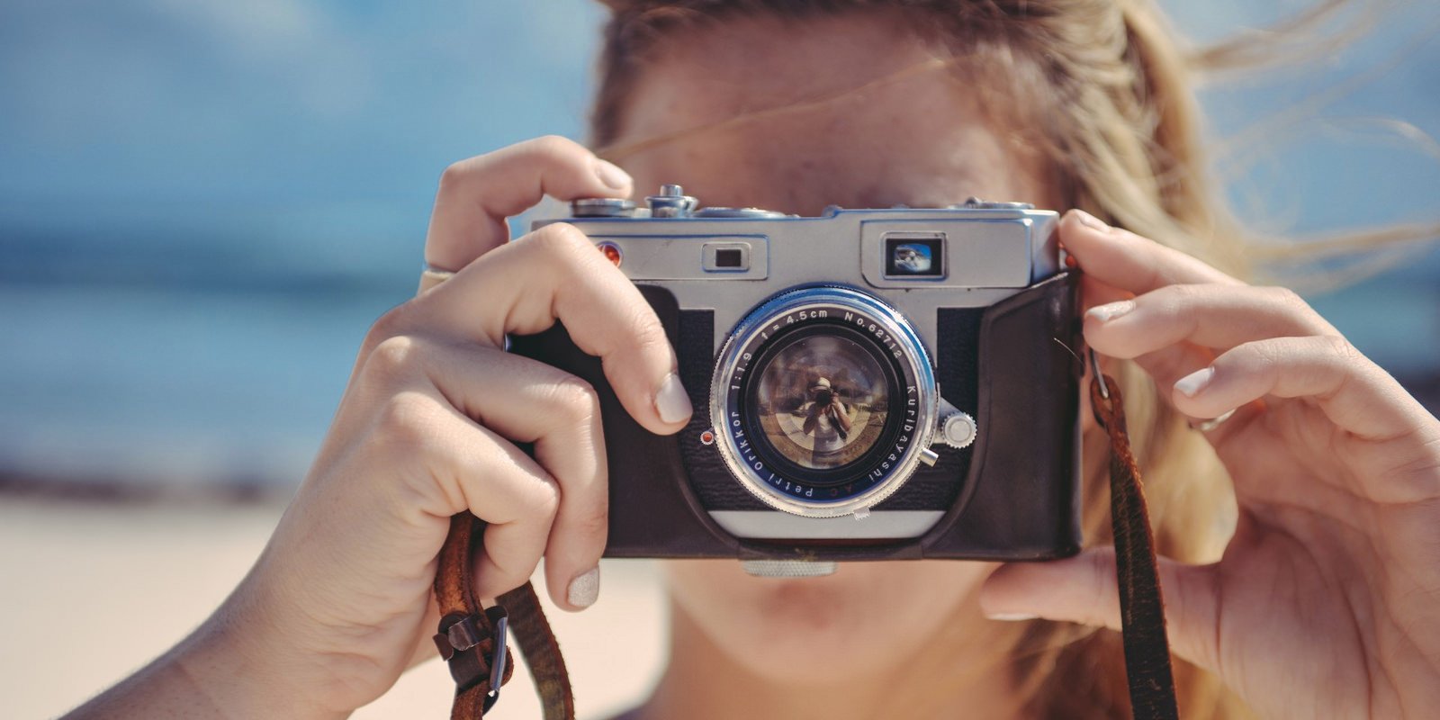 camera woman photographer beach