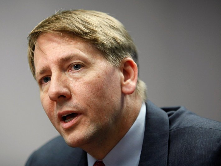 Consumer Financial Protection Bureau (CFPB) Director Richard Cordray answers questions at the Reuters Washington Summit in Washington, DC, U.S. October 23, 2013.   REUTERS/Jonathan Ernst/File Photo 