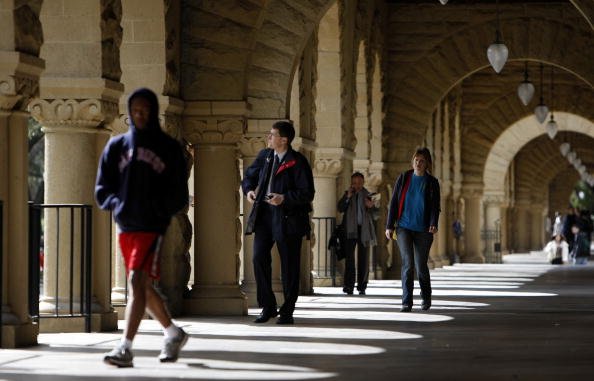 UNITED STATES - FEBRUARY 20: Students walk through an open corridor on the Stanford University campus in Palo Alto, California, U.S., on Wednesday, Feb. 20, 2008. Stanford University raised the most money among academic institution for the third year in a row, aided by a $51 million donation from the estate of a 1927 graduate. (Photo by Erin Lubin/Bloomberg via Getty Images)